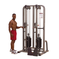 Man using PCL dual cable machine with 160 lb weight stacks for strength training in a home gym.