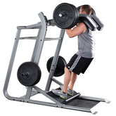 Man using PROCLUBLINE Leveraged Calf Squat machine for effective squats and calf workouts in gym.