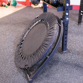 Ball Rebounder Attachment for SPR1000, SPR500 showcased in a gym setting with a focus on its unique design.